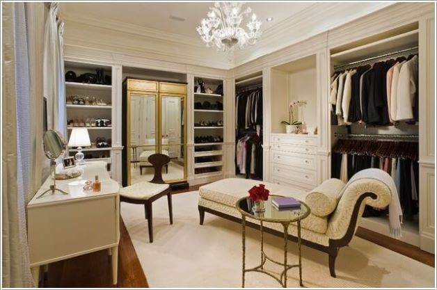 luxury walk in closet with chaise lounge