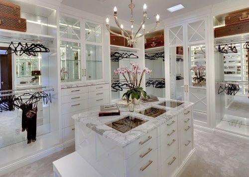 mirrors in luxury walk-in closet