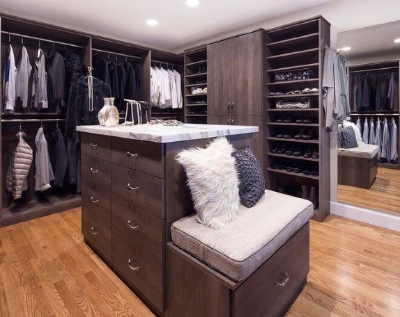 seating in luxury walk-in closet