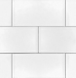 white ceramic subway tile backsplash