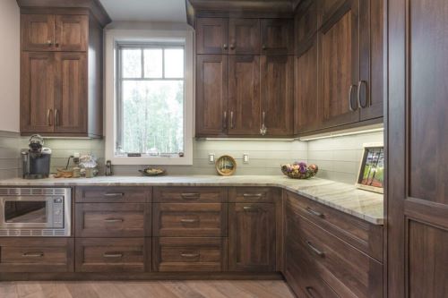 Dark stain on Walnut kitchen cabinets