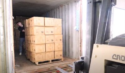 Build a pallet load of cartons inside shipping container