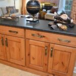 Stained rustic alder cabinet