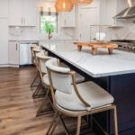 Custom blue paint on island from Brighton Cabinetry